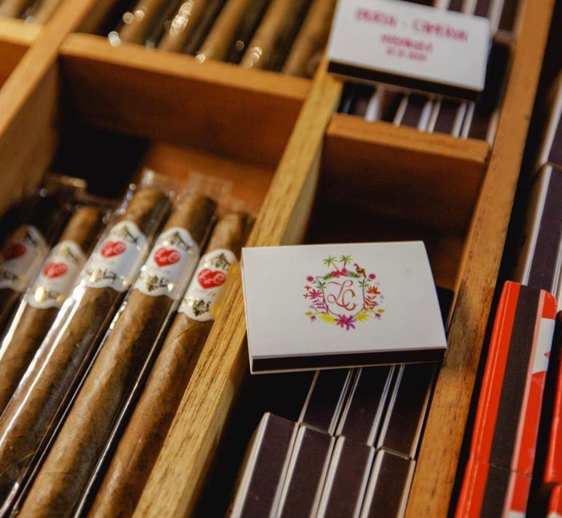 tropical wedding crest on matchbox