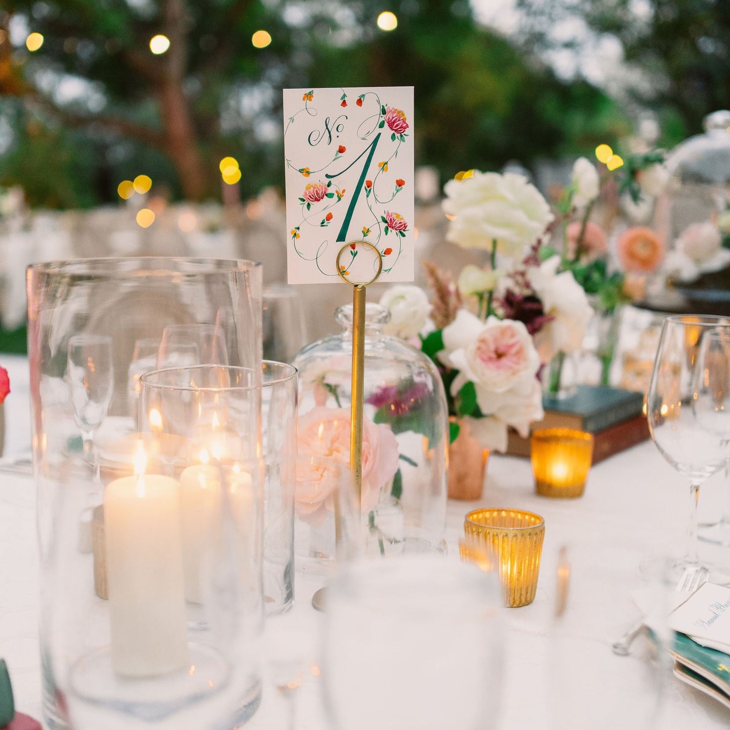 Personalized floral table numbers
