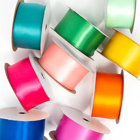 Rolls of colorful satin ribbon